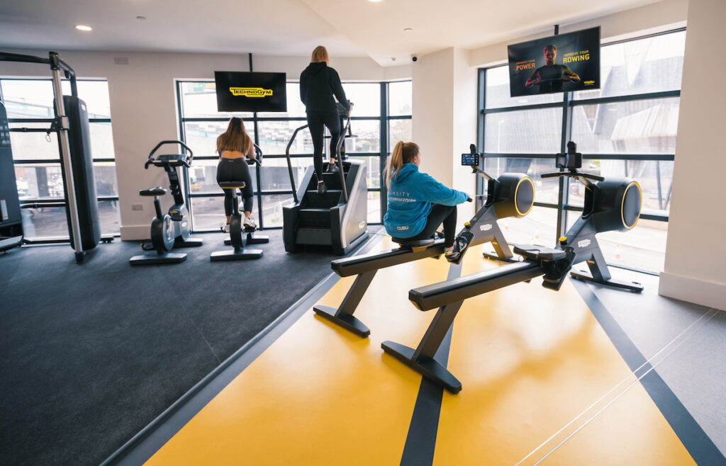 Students on cardio equipment - Technogym | CODE Students | PBSA News