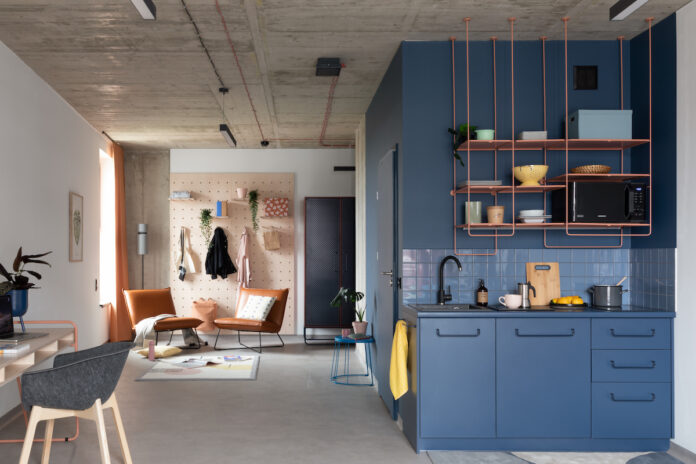 Extra large Łódź studio kitchenette room - Basecamp Group | Xior | PBSA News