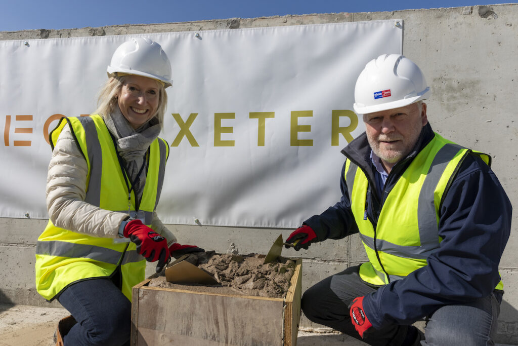 Topping out at Ty Nant, Swansea. L-R Sarah Sergeant, CFO and Richard Harris, MD of Delivery at Watkin Jones plc | PBSA News