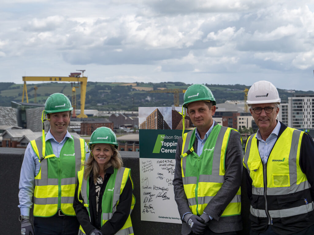 Representatives celebrating the topping out ceremony at Nelson Street | PBSA News