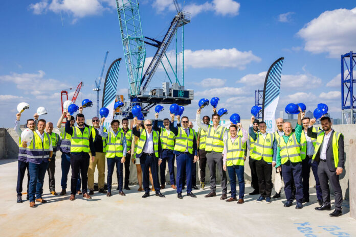 Your Tribe and HG Construction celebrating the topping out of the Ilderton Road PBSA scheme. Image credit: Danny Loo Photography | PBSA News Your Tribe and HG Construction celebrating the topping out of the Ilderton Road PBSA scheme. Image credit: Danny Loo Photography | PBSA News