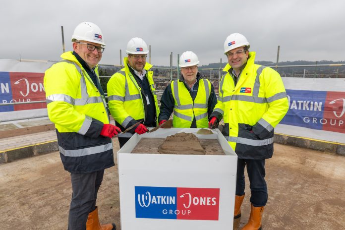 L to R: Gwyn Pritchard, MD – Group Construction, Watkin Jones; Alex Pease, CEO, Watkin Jones; Richard Harris, MD – Group Delivery, Watkin Jones; and Russell Petrie, Head of Student Housing – Europe, EQT Exeter celebrating topping out at The Brook student accommodation scheme | PBSA News L to R: Gwyn Pritchard, MD – Group Construction, Watkin Jones; Alex Pease, CEO, Watkin Jones; Richard Harris, MD – Group Delivery, Watkin Jones; and Russell Petrie, Head of Student Housing – Europe, EQT Exeter celebrating topping out at The Brook student accommodation scheme | PBSA News