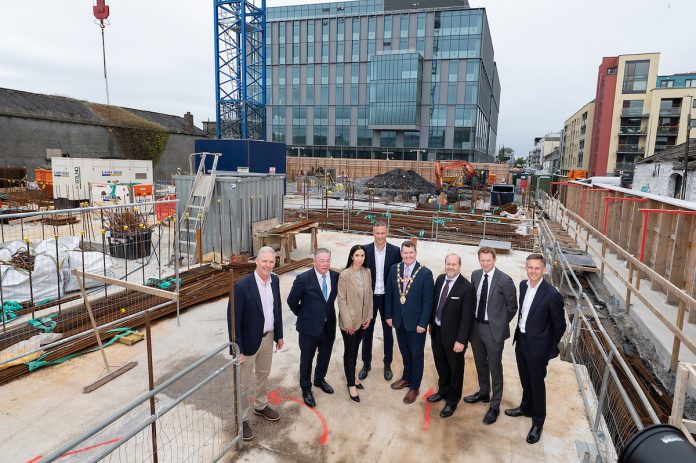 Pictured left to right - Brendan Davey (Director – Monami Construction), Ciarán McIntyre (Co-Founder & Head Of Real Estate - Elkstone), Daniela Murphy ( Real Estate Senior Marketing Executive), Joe Bergin (Managing Director, Head of Private Clients – Elkstone), Mayor Peter Keane (Mayor Galway City Council), Ben Chittick (Managing Director, Head of Asset Management – Europe), Brendan Byron (Investment Director - ISIF), Paddy McElligott (Head of Investment - Activate capital) - Queen Street | PBSA News Pictured left to right - Brendan Davey (Director – Monami Construction), Ciarán McIntyre (Co-Founder & Head Of Real Estate - Elkstone), Daniela Murphy ( Real Estate Senior Marketing Executive), Joe Bergin (Managing Director, Head of Private Clients – Elkstone), Mayor Peter Keane (Mayor Galway City Council), Ben Chittick (Managing Director, Head of Asset Management – Europe), Brendan Byron (Investment Director - ISIF), Paddy McElligott (Head of Investment - Activate capital) - Queen Street | PBSA News