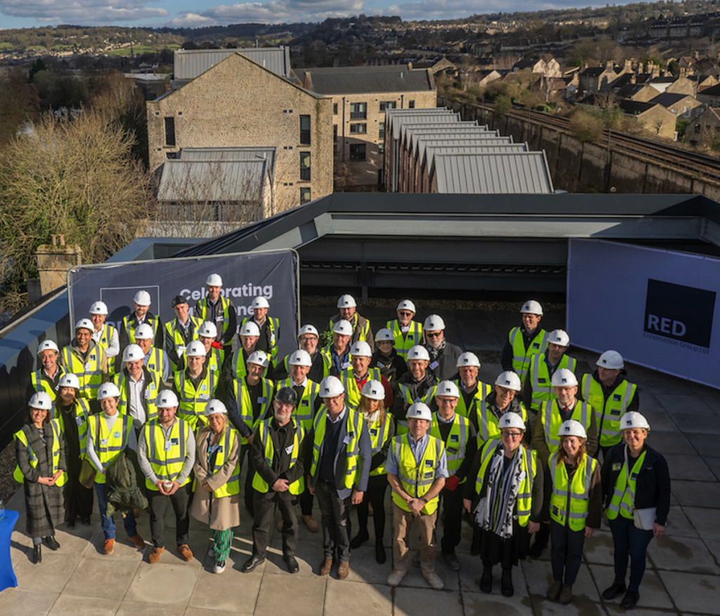 The teams behind Hollis Wharf at its topping out ceremony | RED Construction | Alumno | PBSA News