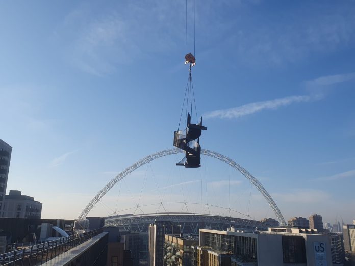 The amenity spiral staircase being installed at Greystar's Canvas Wembley scheme | PBSA News The amenity spiral staircase being installed at Greystar's Canvas Wembley scheme | PBSA News